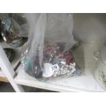 A large quantity of costume jewellery in 2 bags