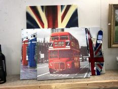 A quantity of London tourist prints on canvas and a mirrored glass tray.