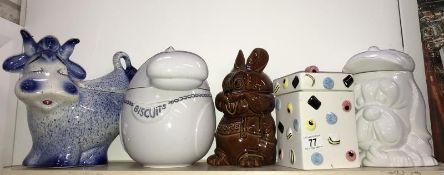 A selection of ceramic biscuit barrels, (Liquorice Allsorts etc.