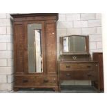 A 1930's mirror door wardrobe and dressing table.