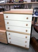 A pair of modern oak effect bedroom chest of drawers