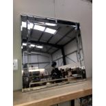 A multiple bevel edged mirror, a/f.