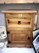 A solid pin rustic style bedside cabinet.