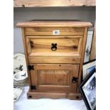 A solid pin rustic style bedside cabinet.