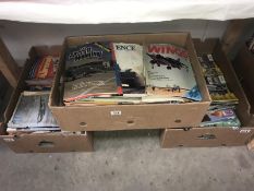 3 boxes of modeller and aircraft magazines, a terracotta pot and 3 folders of silver UN medals.