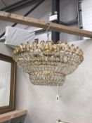 A large gilt brass basket chandelier.