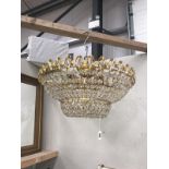 A large gilt brass basket chandelier.