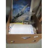 A box of RAF ephemera inc. calendars, cloth badges, magazines, booklets etc.
