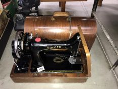 A cased Singer sewing machine