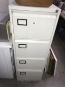 An off white coloured metal 4 drawer filing cabinet