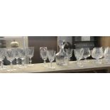 A cut glass decanter and 3 sets of glasses including Edinburgh crystal.