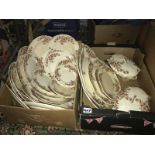 2 boxes of vintage daisy pattern Pearson pottery dinner ware.