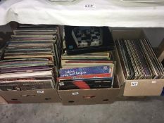 2 boxes of mixed LP records.