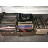 2 boxes of mixed LP records.