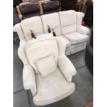 A cream fabric 3 seater sofa,