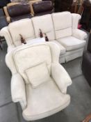 A cream fabric 3 seater sofa,