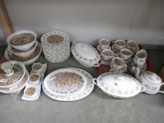 A quantity of bird feeders in assorted china bowls, tureens, teapot etc.