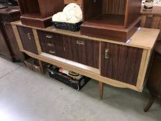 A 1970's teak effect melamine sideboard