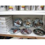 A quantity of boxed Collectors plates