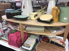 A light wood effect oval coffee table.