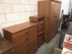 A large double wardrobe, 5 drawer chest and pair of bedside cabinets.