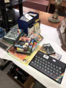 A ZX Spectrum, leads & books etc.