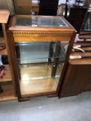 Amodern mahogany display cabinet