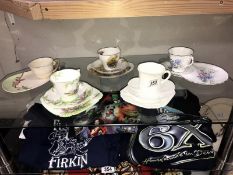 A quantity of porcelain trio's and sandwich sets by Shelley, Royal Albert etc.