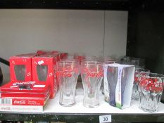 A large quantity of retro coca cola glasses etc.