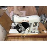 A good cased Jones sewing machine (in working order)