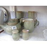 A Denby stoneware teapot, 6 mugs etc.