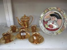 A 12 piece Wade gold coffee set and a Royal Doulton 'The Mayor plate'