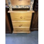 A pine 3 drawer bedside chest