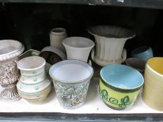 A quantity of various pottery/china planters including German