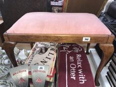 a 1930's oak dressing table stool with Queen Anne legs and pink dralon top.