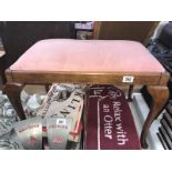 a 1930's oak dressing table stool with Queen Anne legs and pink dralon top.