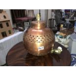 A large art copper table lamp.
