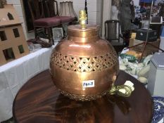 A large art copper table lamp.