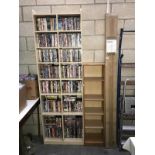 Over 300 Dvd's on a storage unit & 1 other & new CD storage shelves in box