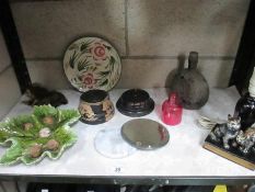 A mixed lot of items including a Bretby walnut dish, Wade plate, cranberry dish, stirrup cup etc.