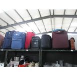 A quantity of suitcases etc.