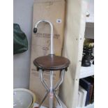 A vintage tripod folding seat come walking stick in original box