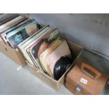 A quantity of LP records and 45 rpm singles in 2 boxes and 1 case