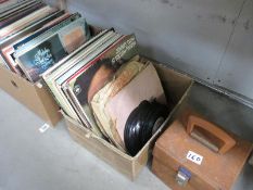 A quantity of LP records and 45 rpm singles in 2 boxes and 1 case