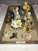 A mixed lot of china animals including Royal Doulton, Beswick, Wade, Goebel etc.