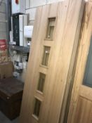 5 solid wood doors (2 with glass inserts) with hinges in box.