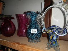 2 cranberry glass vases and 2 others