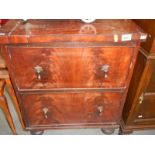 A 2 drawer mahogany chest of drawers