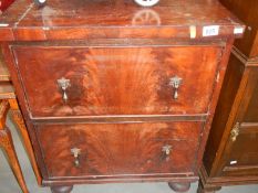 A 2 drawer mahogany chest of drawers