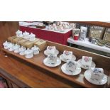 A set of 6 Royal Worcester coffee cups and saucers and 9 boxed Russ trinket boxes